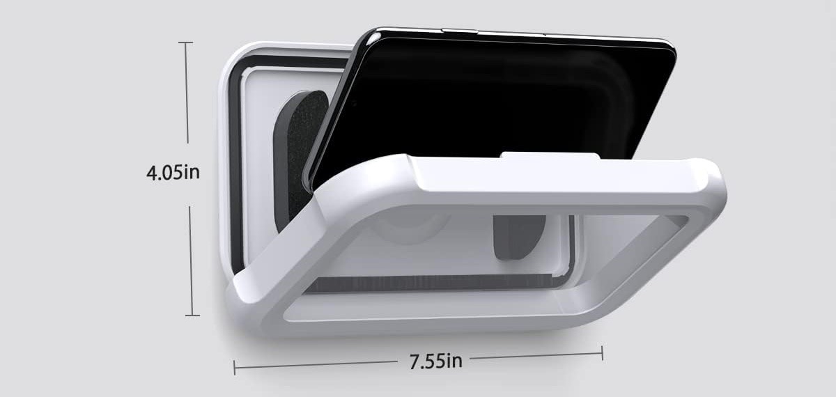 ShowerDock case opened with a phone sliding in; case measures 7.55 by 4.05 inches